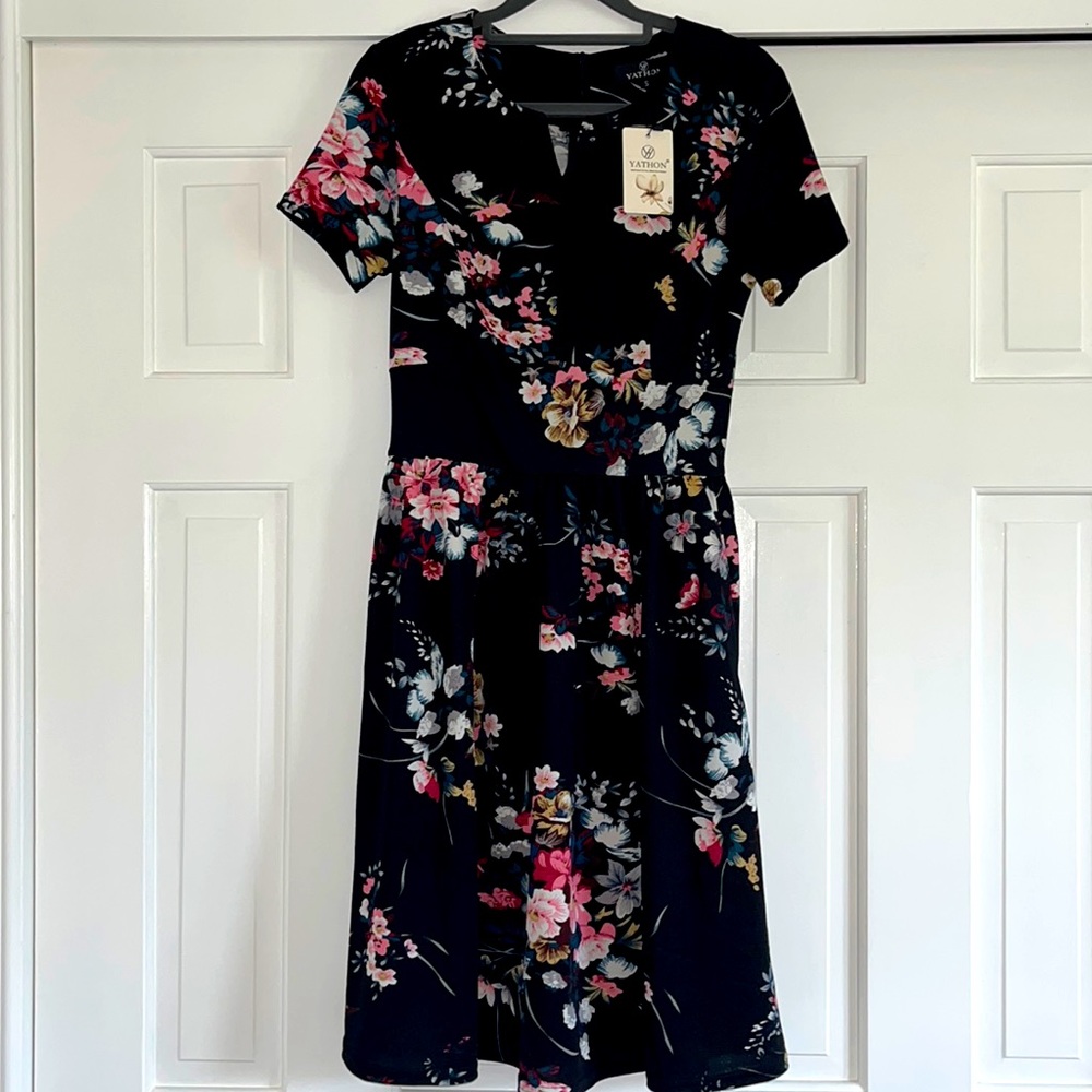 Yathon size small dress. Never worn. New with tags